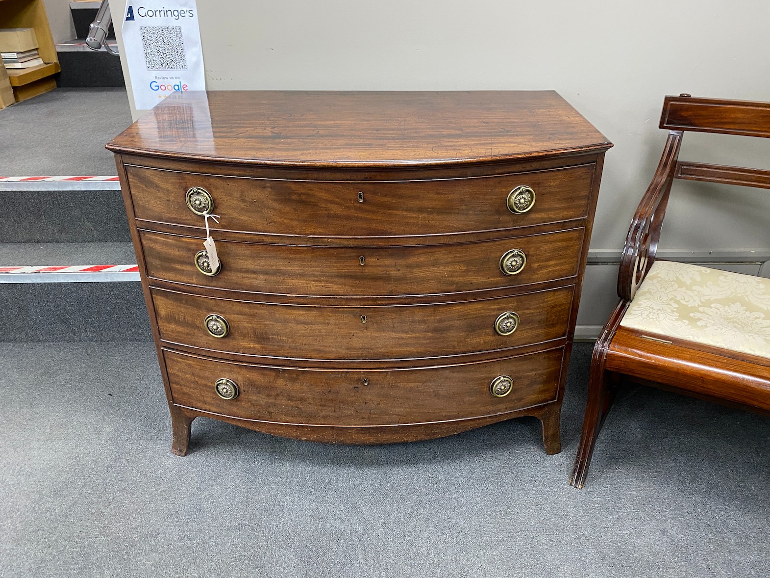 A George III mahogany bowfront dressing chest, with fitted interior, width 106cm, depth 61cm, height 85cm